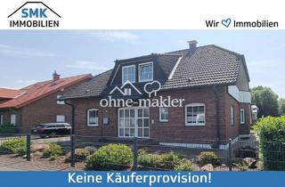 Haus kaufen in 33758 Schloß Holte-Stukenbrock, Gepflegtes Zweifamilienhaus mit Garagen und Vollkeller!