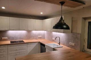 Wohnung kaufen in 32312 Lübbecke, Lübbecke - komplett renovierte Eigentumswohnung mit Balkon und Garten
