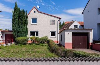 Einfamilienhaus kaufen in 64569 Nauheim, Jung & Kern Immobilien - Charmantes Einfamilienhaus mit großem Potenzial in zentraler Lage