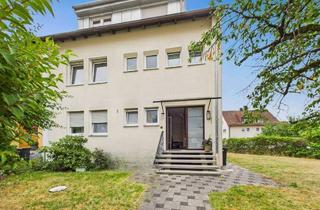Haus kaufen in 90537 Feucht, Gepflegtes Dreifamilienhaus mit großem Grundstück und einer freien Wohnung