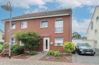 Doppelhaushälfte kaufen in 47443 Moers, Moers - Familienidyll: Gepflegte Doppelhaushälfte mit grüner Oase in ruhiger Lage von Moers