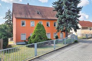 Mehrfamilienhaus kaufen in Schulgasse, 01589 Riesa, ***JETZT AN DIE ALTERSVORSORGE DENKEN - RENDITEOBJEKT FÜR VERMIETER IN RIESA*** Mehrfamilienhaus mit 4 Wohneinheiten, Garagen, Stellflächen und Garten in ruhiger, städtischer Randlage