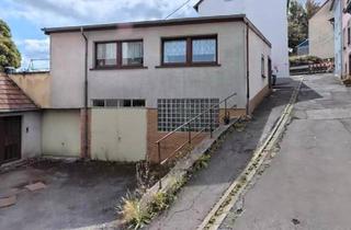 Einfamilienhaus kaufen in 66564 Ottweiler, Ottweiler - Charmantes Einfamilienhaus mit Terrasse, Lagerraum und Garage
