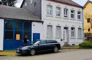 Haus kaufen in 53940 Hellenthal, Hellenthal - 2 Fam Haus mit großer kfz Halle von privat zu verkaufen