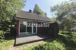 Einfamilienhaus kaufen in 37603 Holzminden, Familienfreundliches Einfamilienhaus mit großem Grundstück und ausgebautem Dachgeschoss in Neuhaus