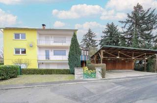 Wohnung kaufen in 61231 Bad Nauheim, Bad Nauheim - Die Sonne genießen: ETW mit Garten und Carport