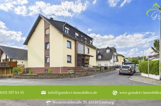 Anlageobjekt in 65589 Hadamar, Mehrfamilienhaus mit Garagen und Anbau - Investieren mit Substanz