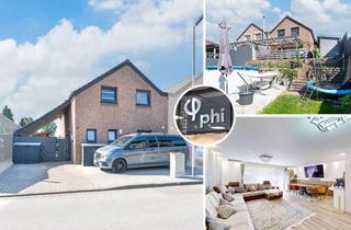 Haus kaufen in 52441 Linnich, Linnich - PHI AACHEN - Familienfreundliches Wohndomizil mit Stellplätzen auf sonnigem Grund in Linnich!