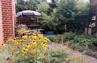 Wohnung kaufen in 26871 Papenburg, Papenburg - Gepflegte Erdgeschoss Eigentumswohnung mit idyllischem Garten