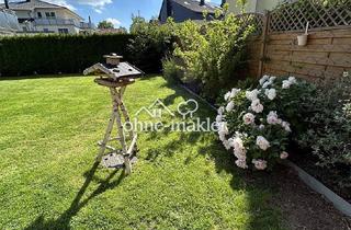 Wohnung kaufen in 82538 Geretsried, Traumhafte Gartenwohnung - top modernisiert, sofort bezugsfrei & mit großem Privatgarten