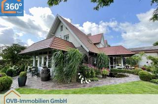 Haus kaufen in 26629 Großefehn, Hochwertiges Wohnhaus im Landhausstil mit liebevoll angelegtem Garten und großer Halle
