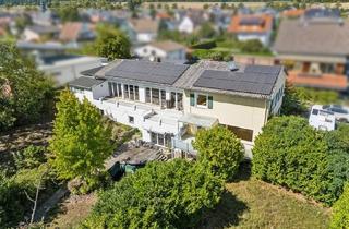 Mehrfamilienhaus kaufen in 65510 Hünstetten, Exklusives Wohnensemble: Wohnhaus zur Eigennutzung und attraktiver Zusatzrendite