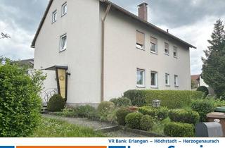 Haus kaufen in 91088 Bubenreuth, Gepflegtes Wohnhaus mit drei Mieteinheiten