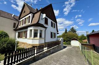 Einfamilienhaus kaufen in 55278 Undenheim, Einfamilienhaus mit großem Garten und Garage