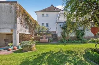 Einfamilienhaus kaufen in 76275 Ettlingen, Gepflegtes Anwesen am Ettlinger Vogelsang mit großer Terrasse, schönem Garten und zwei Garagen