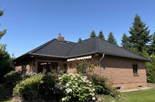 Haus kaufen in 21376 Salzhausen, Winkel-Bungalow mit Vollkeller und zwei Garagen in zweiter Reihe, mitten in Salzhausen