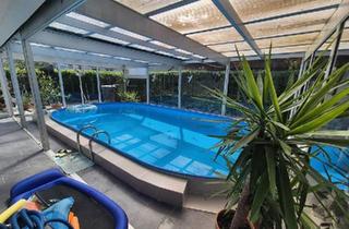 Einfamilienhaus kaufen in 55494 Rheinböllen, Rheinböllen - Familientraum in Rheinböllen: Großzügiges Haus mit Pool & Garten