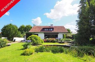Einfamilienhaus kaufen in 66740 Saarlouis, Saarlouis - Wohnen im Grünen: Einfamilienhaus mit parkähnlichem Grundstück in den Gartenreihen
