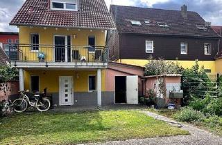 Einfamilienhaus kaufen in 68753 Waghäusel, Waghäusel - Mehrfamilienhaus mit 4-Wohneinheiten Garten, Garage und 2 Stellplätzen
