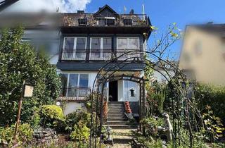 Doppelhaushälfte kaufen in 56859 Bullay, Bullay - Modernisierte Doppelhaushälfte mit traumhafter Aussicht, liebevoll angelegtem Garten und Carport