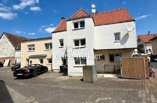 Einfamilienhaus kaufen in 61184 Okarben, Vielseitig nutzbares Einfamilienhaus mit Anbau in zentraler Lage von Okarben