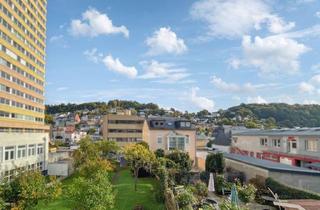 Haus kaufen in 55743 Idar-Oberstein, Idar-Oberstein: Großzügiges Reihenmittelhaus mit vermieteter Wohnung und großem Garten