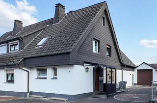 Doppelhaushälfte kaufen in 59757 Arnsberg, Arnsberg - Vielseitig nutzbares Ein- oder Zweifamilienhaus mit schönem Garten in ruhiger Lage von Bergheim!