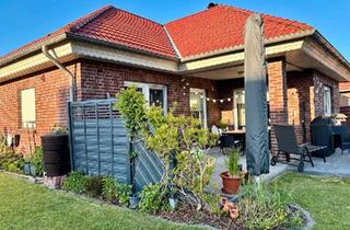 Einfamilienhaus kaufen in 26723 Emden, Emden - Ausgebauter Winkelbungalow mit viel Platz. Provisionsfrei!!