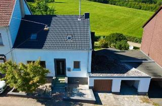 Einfamilienhaus kaufen in 66346 Püttlingen, Püttlingen - Modernisiertes Einfamilienhaus mit Doppelgarage & Garten