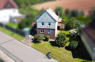 Einfamilienhaus kaufen in 37355 Gerterode, Raum für Ideen – Einfamilienhaus mit Potenzial in ruhiger Lage in Gerterode!