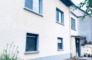 Einfamilienhaus kaufen in 55758 Niederwörresbach, Niederwörresbach - Einfamilienhaus mit Einliegerwohnung in 55758 Langweiler