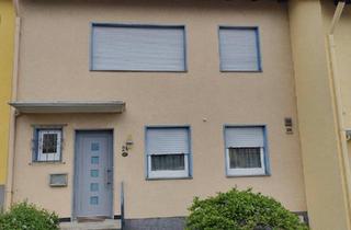 Reihenhaus kaufen in 32676 Lügde, Lügde - Reihenhaus mit Terrasse und Garage, Pelletheizung, PV-Anlage