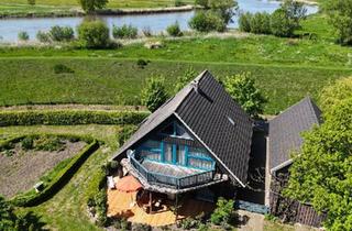 Einfamilienhaus kaufen in 25569 Kremperheide, Kremperheide - Ökologisches Holzhaus mit großem Nebengebäude in fast Alleinlage