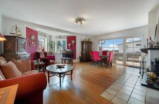 Wohnung kaufen in 61250 Usingen, Usingen - Familientraum auf zwei Ebenen - großzügige Maisonettewohnung in ruhiger Lage