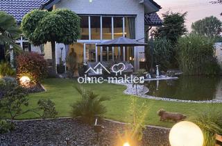 Villa kaufen in 46562 Voerde, Exklusives Einfamilienhaus mit Wellnessgarten - Wohnen auf höchstem Niveau
