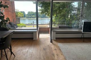 Wohnung kaufen in 50999 Köln, Köln - Exklusive Rarität direkt am Rhein -Wohnen mit unverbaubarem Blick
