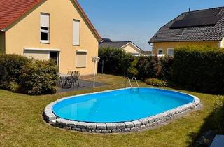 Einfamilienhaus kaufen in 38325 Roklum, Roklum - Einfamilienhaus mit Pool, Garage und Garten im Neubaugebiet