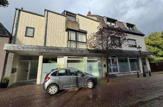 Haus kaufen in Adolph-Kolping-Straße 1, 41352 Korschenbroich, Korschenbroich - Großzügige Eigentumswohnung mit vermietetem Ladenlokal in zentraler Lage