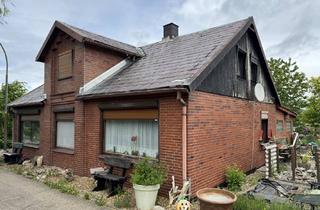 Einfamilienhaus kaufen in 25572 Kudensee, Lage zum Verlieben, Haus zum Anpacken: Sanierungsobjekt direkt am Kudenseer-Kanal