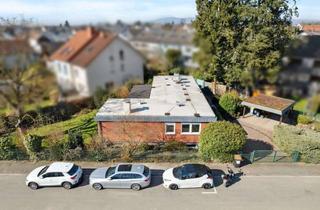 Immobilie kaufen in 60437 Frankfurt, Attraktives Eckgrundstück mit Potenzial in begehrter Wohnlage von Frankfurt-Harheim