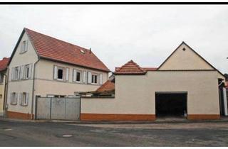 Einfamilienhaus kaufen in 55278 Mommenheim, Mommenheim - Vermietetes EFH zu verkaufen