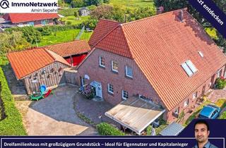 Haus kaufen in 26188 Edewecht, Edewecht - Dreifamilienhaus mit großem Grundstück - ideal für Eigennutzer und Investoren