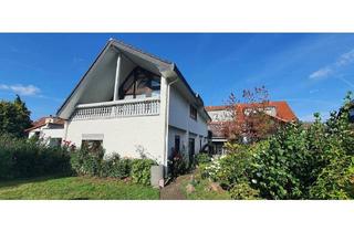 Haus kaufen in 63505 Langenselbold, Langenselbold - Zwei Häuser - ein Ensemble voller Möglichkeiten: Wohnen, Arbeiten, Vermieten...