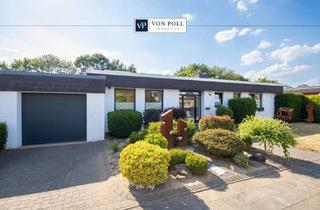 Haus kaufen in 41540 Dormagen, Stilvoller Bungalow mit Einliegerwohnung, Pool und weitläufigem Garten