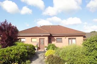 Haus kaufen in 26340 Zetel, Wohnen auf einer Ebene-Bungalow mit Garage in Zetel