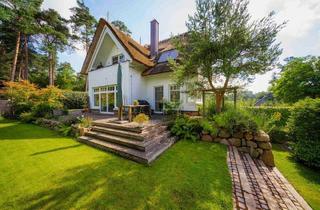 Haus kaufen in 21244 Buchholz in der Nordheide, Buchholz in der Nordheide - Exklusives Reetdachhaus in bester Lage von Buchholz i.d.N. - Architektenhaus mit Blick ins Grüne!