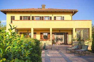 Einfamilienhaus kaufen in 97464 Niederwerrn, Niederwerrn - Mediteranes Wohnen in entspannter Atmosphäre mit Komfort und Stil - EFH mit 2x ELW in Niederwerrn -