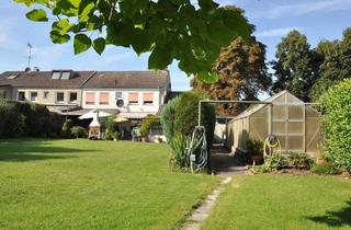 Doppelhaushälfte kaufen in 47139 Duisburg, Duisburg - Sonniger Ausblick am Rheindeich: DHH mit großem Grundstück, Wirtschaftsanbau, Garage, Stellplatz