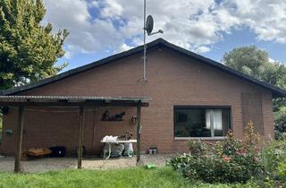 Einfamilienhaus kaufen in 21368 Dahlenburg, Wohnen oder Arbeiten ! Bungalow mit großem Grundstück und großer Lagerhalle mitten in Dahlenburg