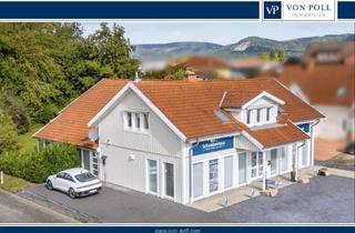 Haus kaufen in 34225 Baunatal, Charmantes Schwedenhaus: Vielseitiges Wohn- und Geschäftshaus mit großzügigem Garten und Raumvielfalt